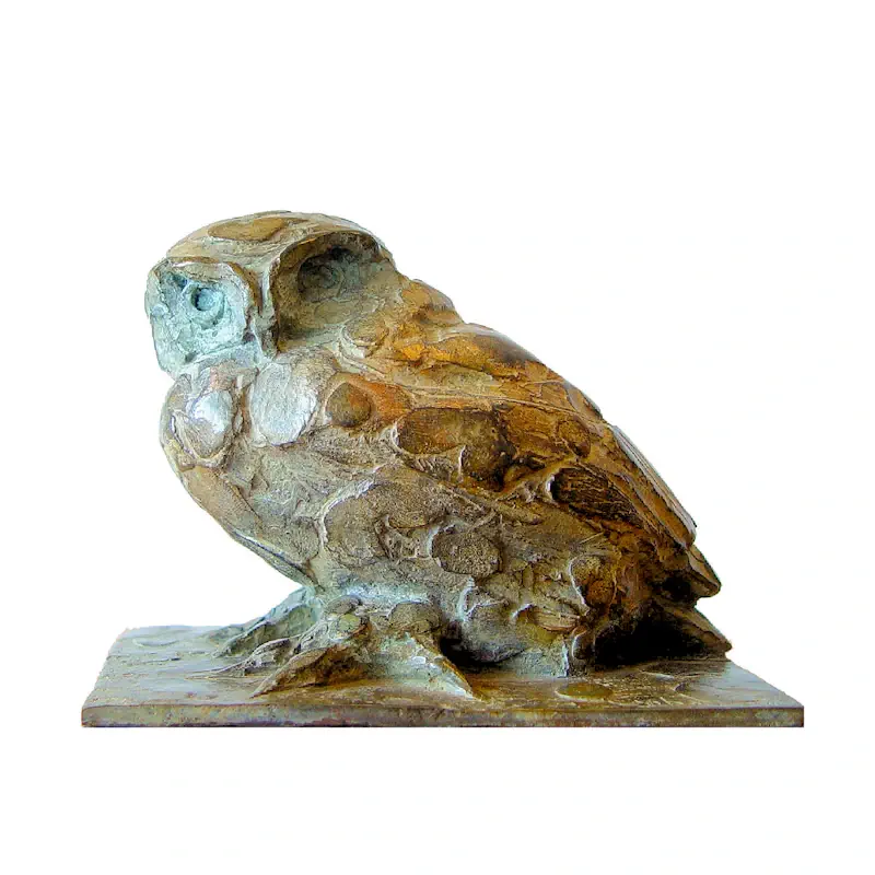 Little Owl sitting by Coba Koster | animal sculpture in bronze edition of 8 15 cm wide and 10 cm high
