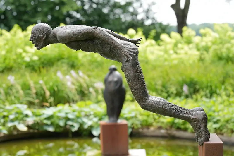 Dive by Edward Vandaele | figure sculpture in bronze edition of 8 180 cm high x 110 cm deep