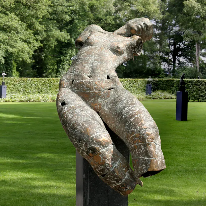 Reclining torso by Gerard Engels | figure sculpture in bronze unique 140 cm high