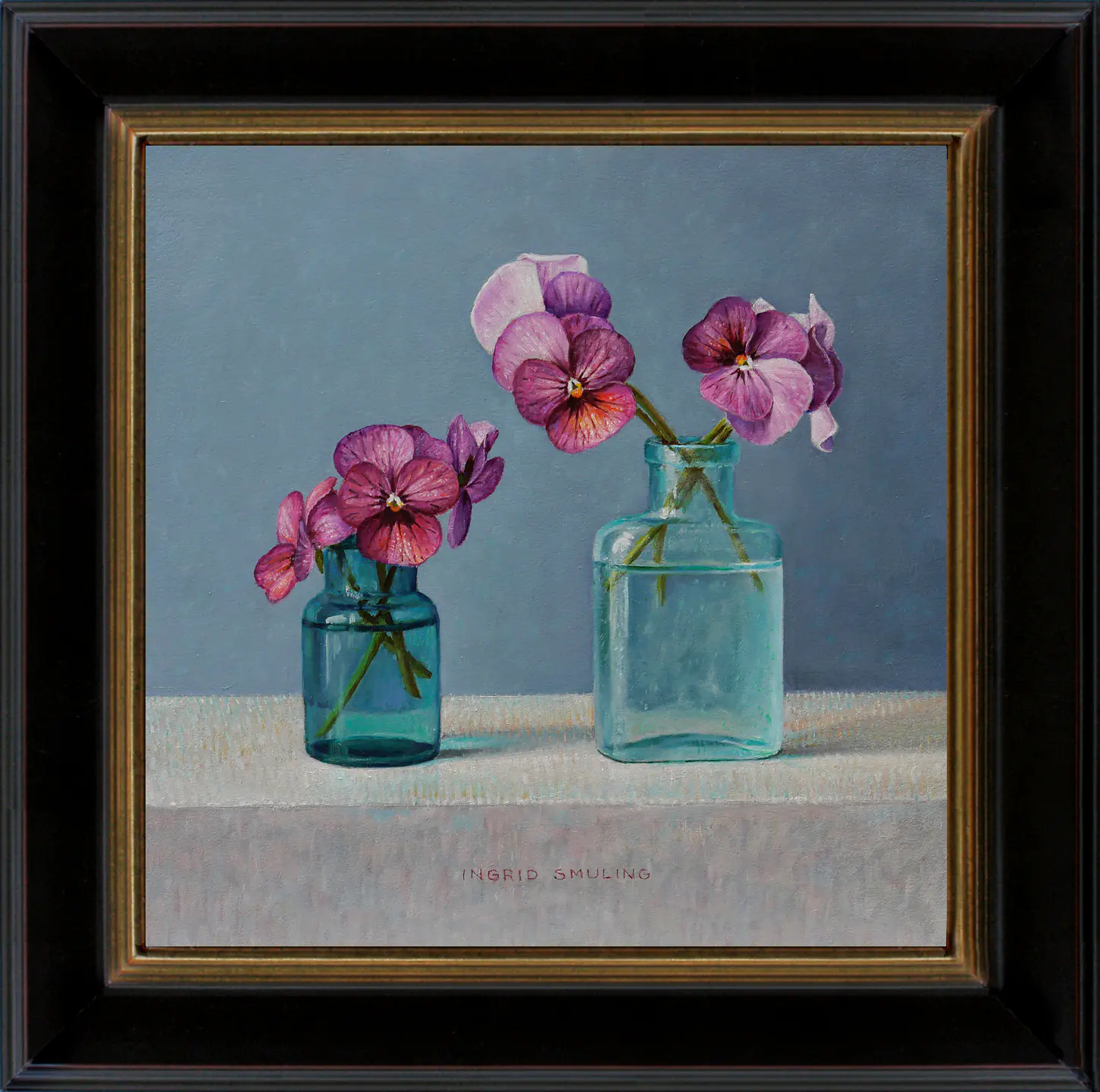 Viooltjes in turquoise flesjes